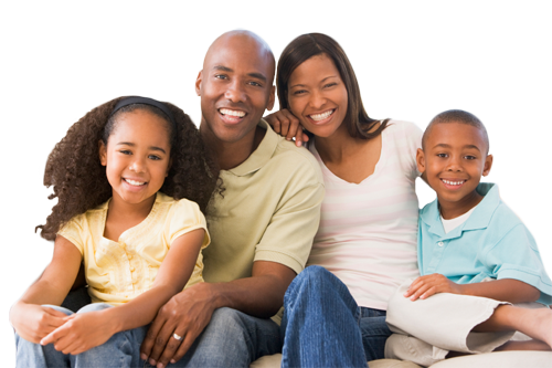 family-smiling-on-couch.png